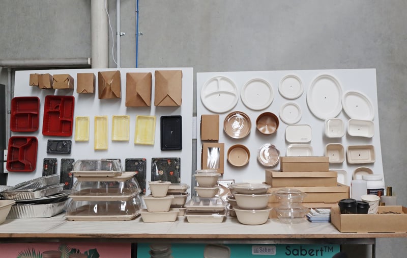 FoodByUs Supplier, CP Blossom's range showcasing plastic, wooden, paper and biocane packaging materials